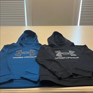 Boys size small.  Under Armour Blue and Black Logo Hoodies